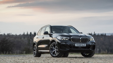 Black BMW X5 front parked
